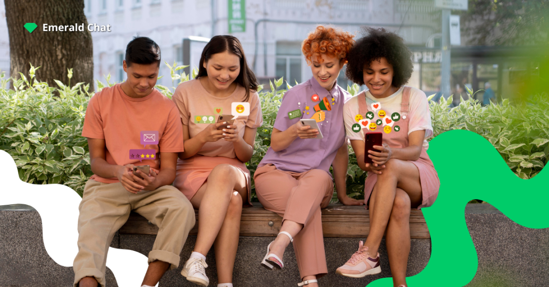 People smiling while holding their phones, symbolizing curiosity and reflection on how chat rooms continue to connect people online.