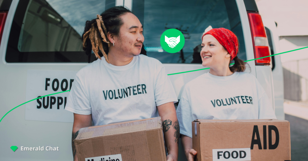 A man and a woman holding boxes